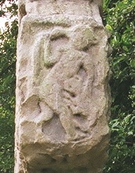 Kells, Patrick and Columba Cross, End of North arm.  David slays a lion or bear